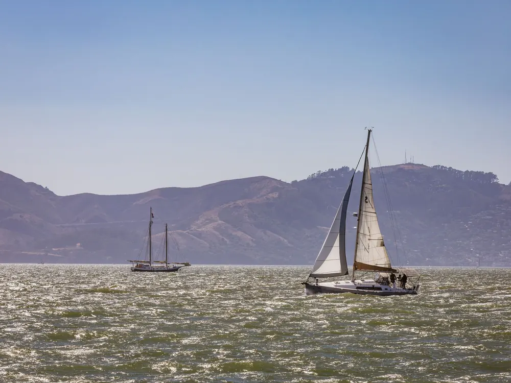 Sailboat near mountains
