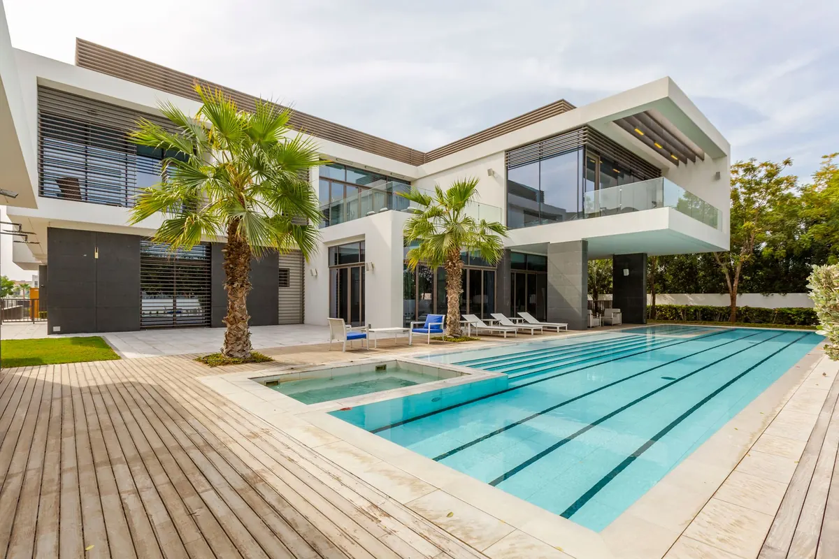 White desert-modern residence with a lap pool
