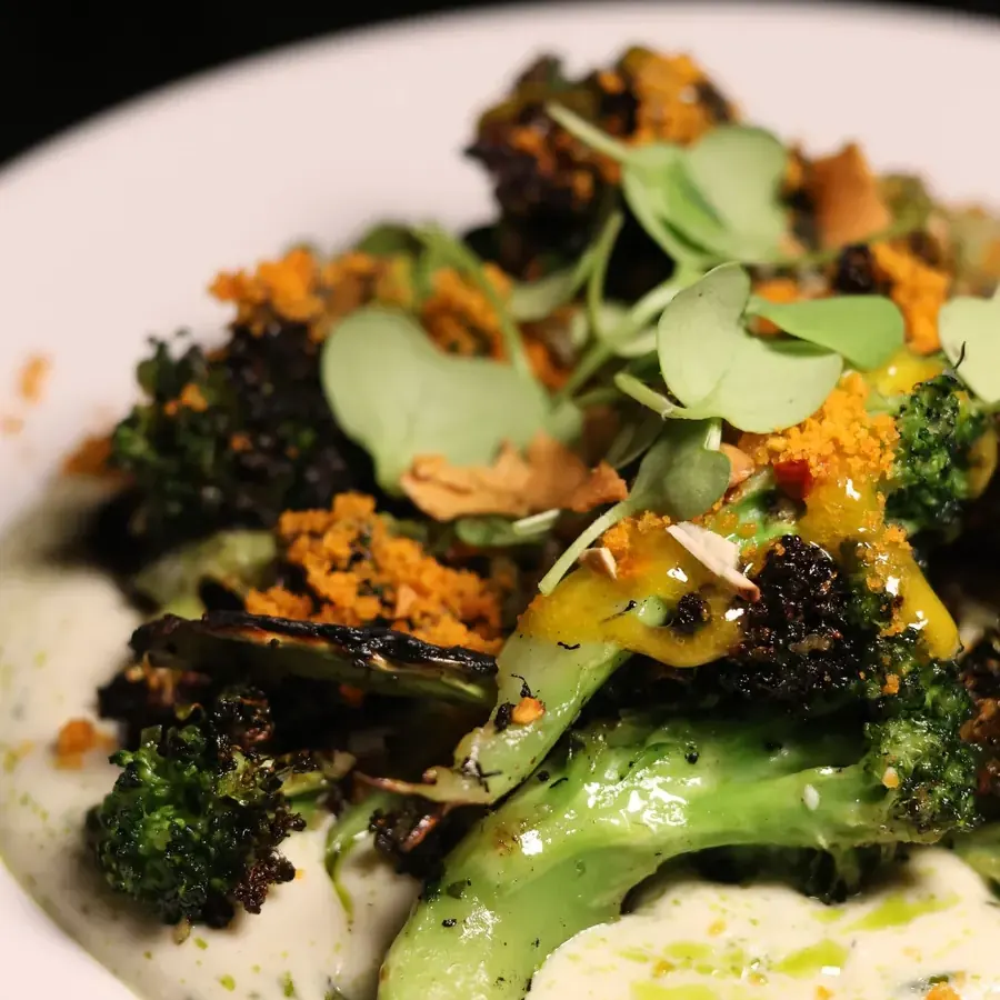 Charred greens with herb sauce